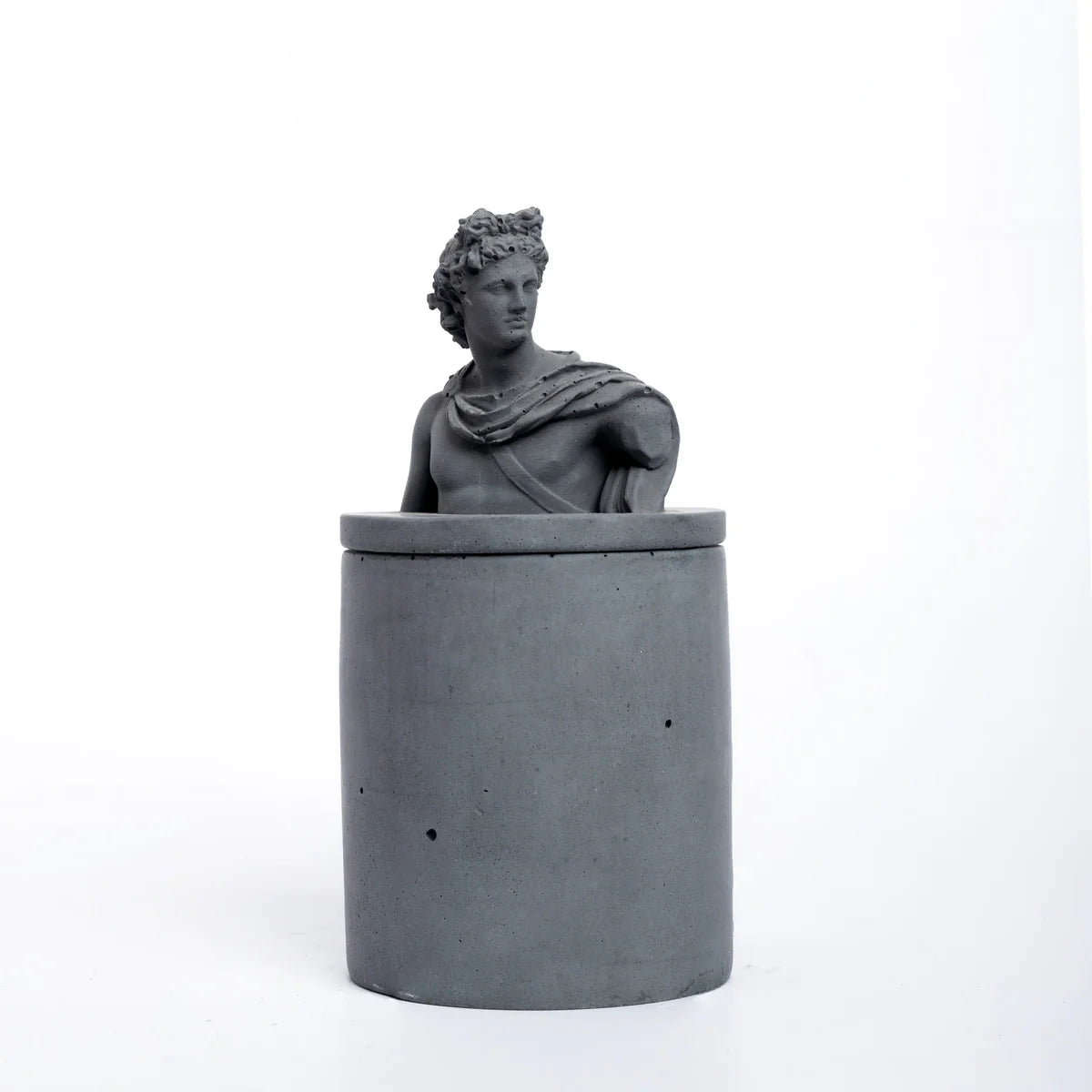 Apollo Atop Dark Concrete-Greek Home Decor- A container with a Greek God lid. Statement decor piece ideal for gifting, home, and work decor.